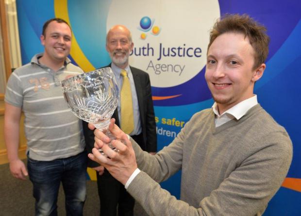 Minister Ford pictured with winner Matthew Carroll and Adam McCartney
