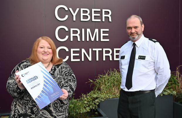 Justice Minister pictured at  cyber crime centre