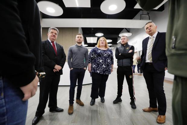 justice minister naomi long pictured with carl frampton and paddy barnes