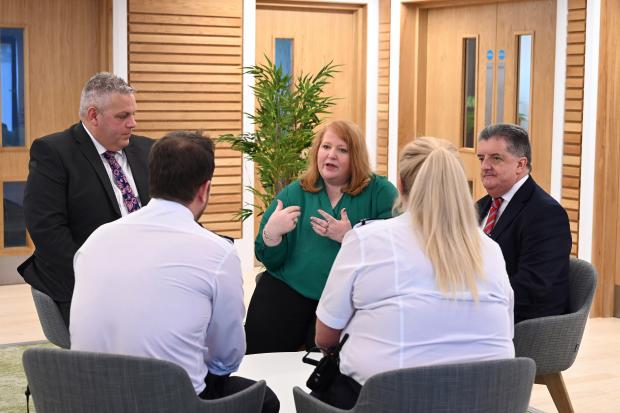 Naomi Long chats to prison officers in the new Staff Wellbeing Hub at Maghaberry Prison